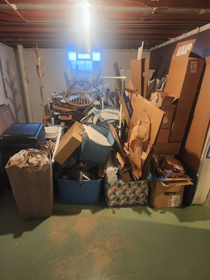 Roll-off dumpster container at job site for 15 Yard Dumpster Rental in Tallapoosa